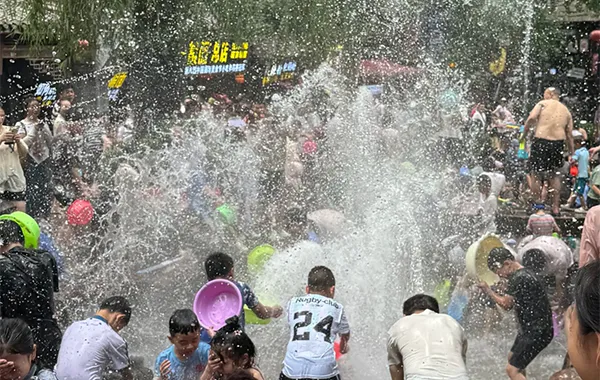 Huanglongxi Playing in the water.webp
