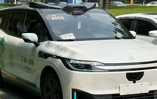 1:00 PM — Robotaxi Ride