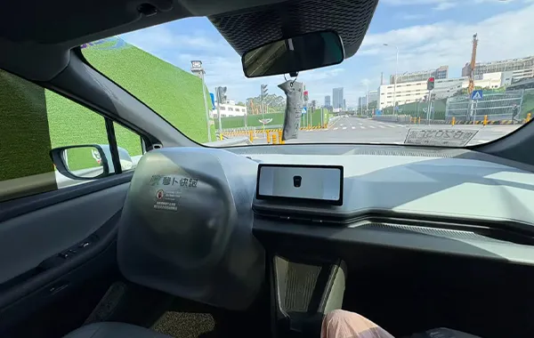 1:00 PM — Robotaxi Ride