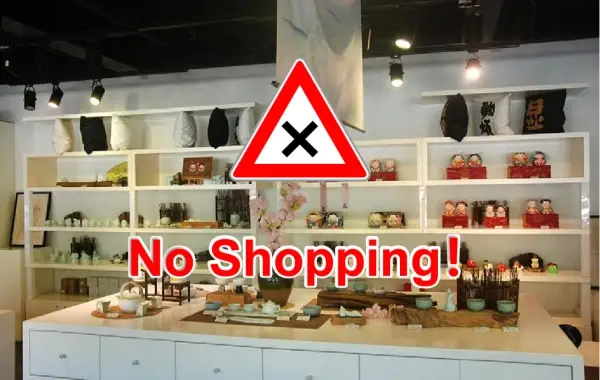 No shopping stop sign inside a souvenir shop